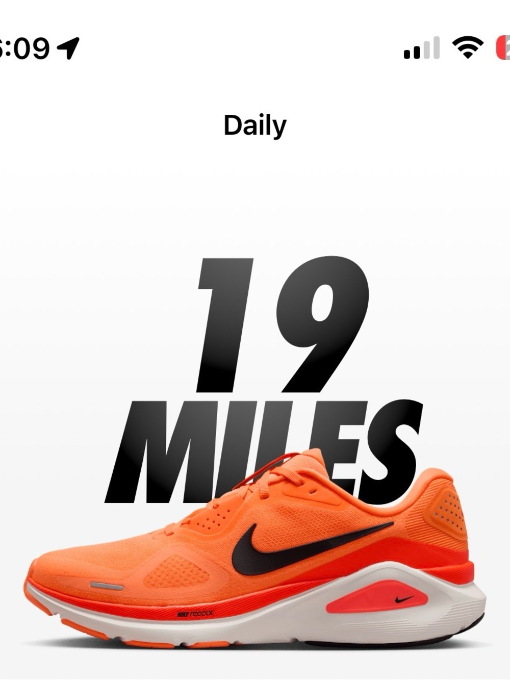 Nike Orange  Structure 26 Running Sneakers with Black Swoosh